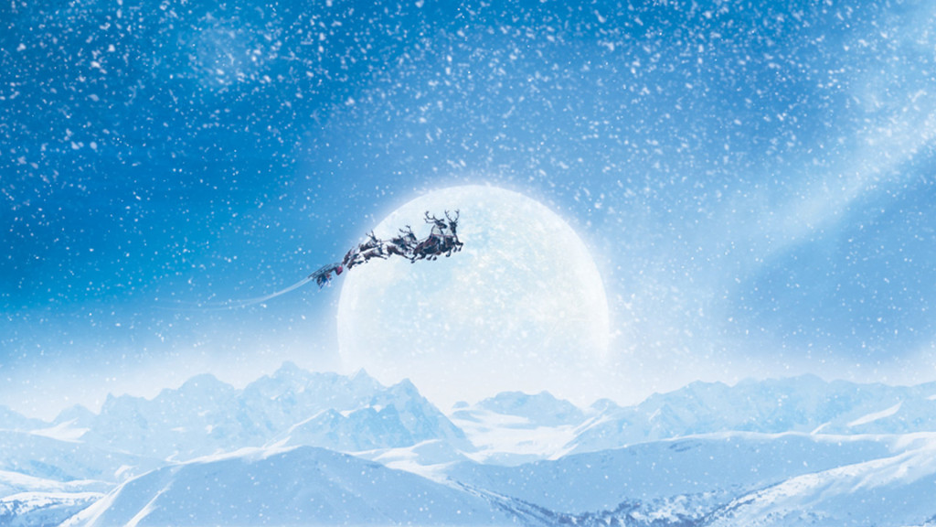 Santa above the clouds in his sleigh